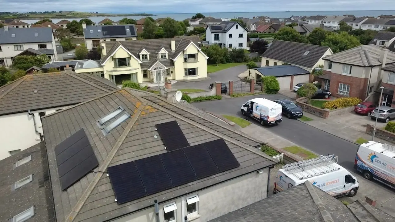 Aerial view of a roof with solar panels